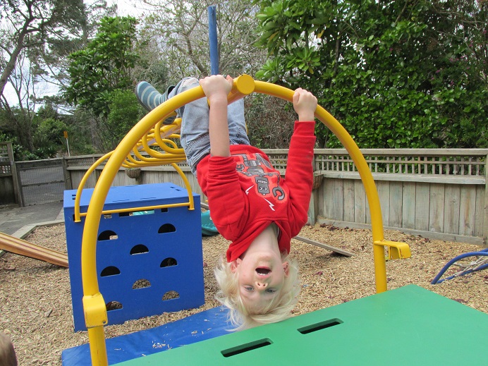 child enjoying outdoor kindergarten activity